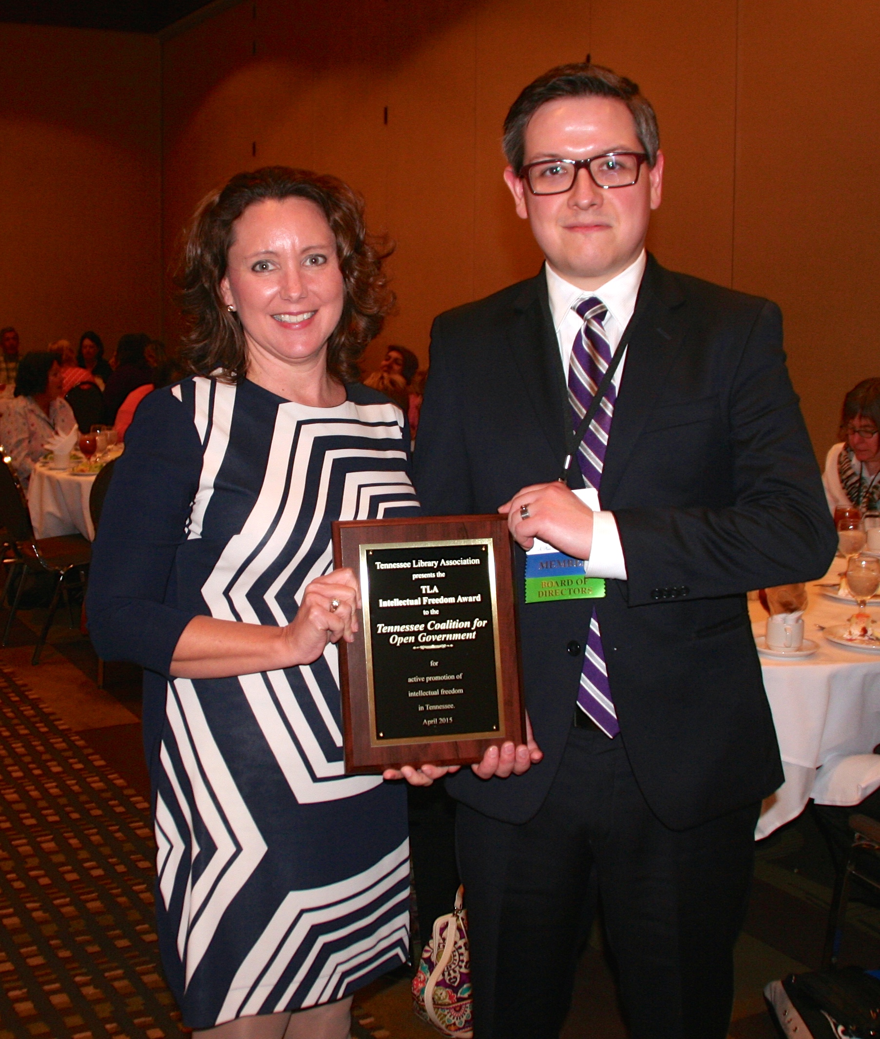 Anthony Prince with the Tennessee Library Association presents TCOG's executive director with TLA's Intellectual Freedom Award at TLA's 2015 conference in Memphis.