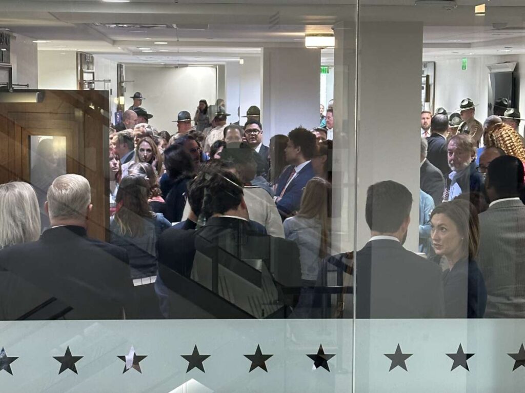 Outside the Senate committee room