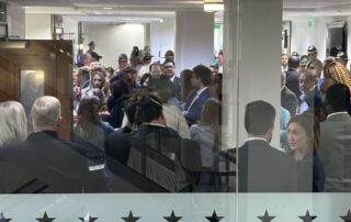 Outside the Senate committee room